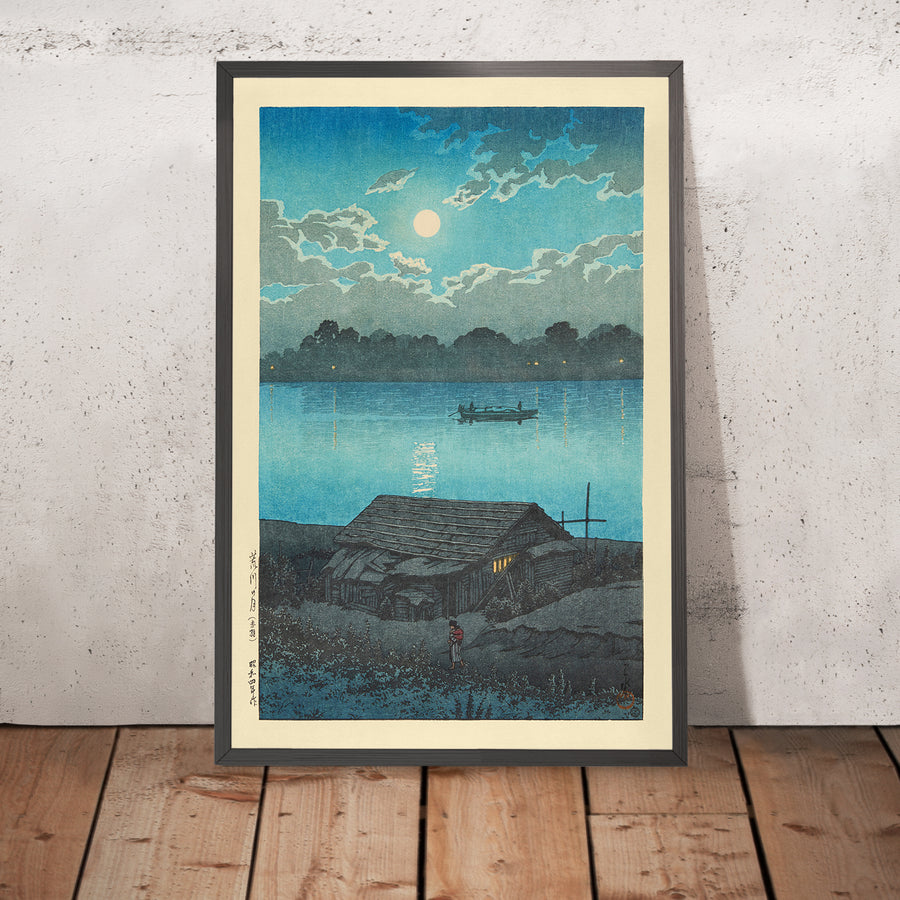 A framed image of Moon on the Arakawa River in Akabane by Hasui Kawase, 1935