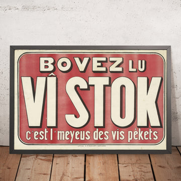 A framed image of Vî Stok Vintage Drinks Advertising Poster, 1900