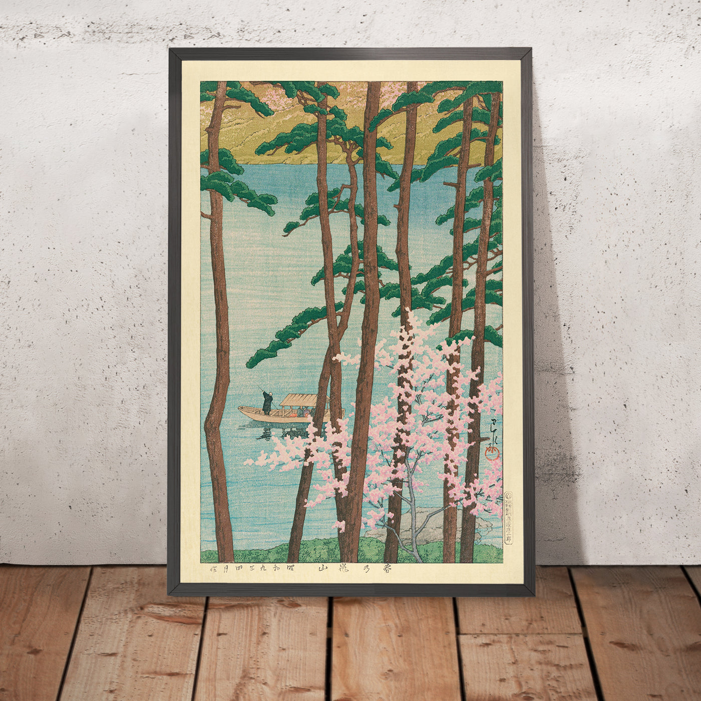 A framed image of Arashiyama in Spring with Cherry Blossom by Hasui Kawase, 1935