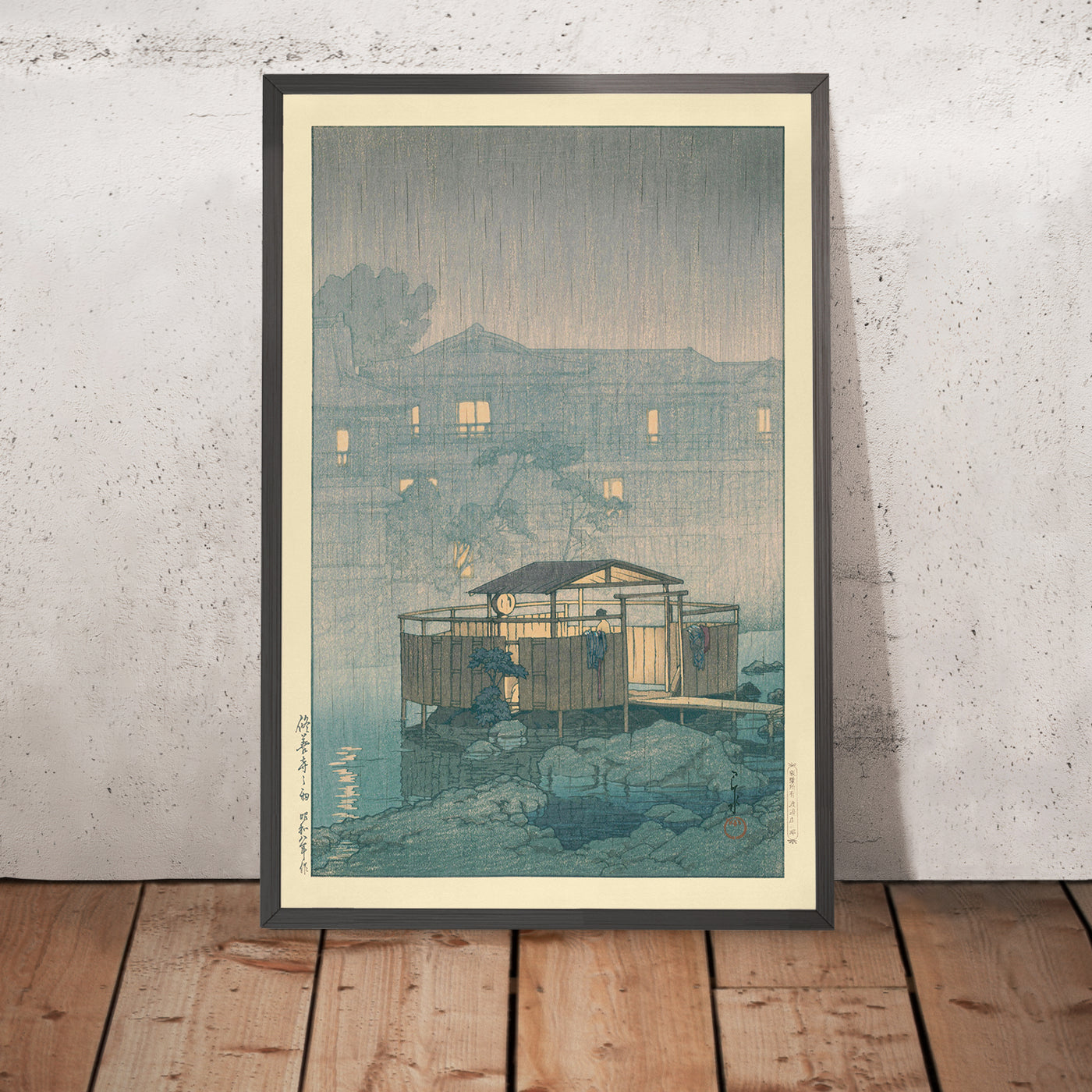 A framed image of Onsen Hot Spring and Rain at Shuzen-ji by Hasui Kawase 1935