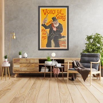 A framed image of Elixir d’Anvers Vintage Liqueur Poster by Hubert Mauquoy, 1900