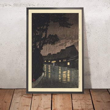 A framed image of Rain at Maekawa, Sagami Province by Hasui Kawase, 1935