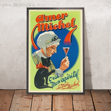 A framed image of Amer Michel Vintage Aperitif Poster, 1920