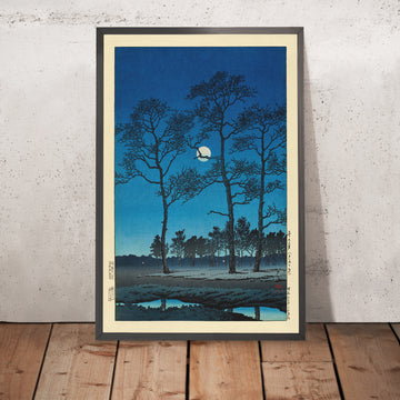 Ein gerahmtes Bild von Winter Moon over Toyama Plain von Hasui Kawase, 1935